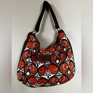 Stylish brown and red patterned women’s bag by WN zag bag designs.